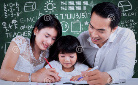  mom, dad, and daughter sitting at a table working on homework